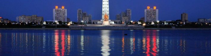 North Korea Things To Do Juche Tower Reflection on the Taedong River - Pyongyang, North Korea (DPRK)